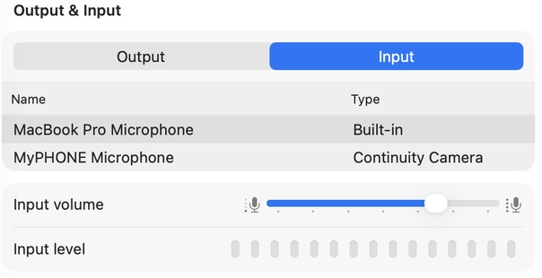 Il pannello Sound di System Settings su macOS, scheda Input, con la lista dei dispositivi e il cursore Input volume regolabile
