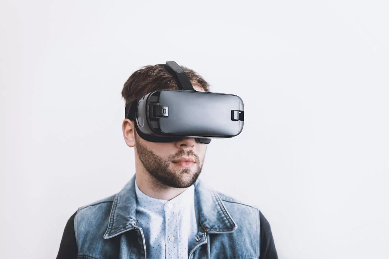 A man wearing a virtual reality headset