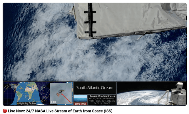 A YouTube live stream of Earth from space in the player, with the LIVE NOW badge and the video title below